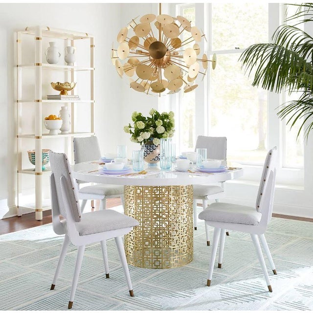 Jonathan Adler Regency Dining Table Gold base with glossy white lacquered top. The top can be used in a grand entry or as...