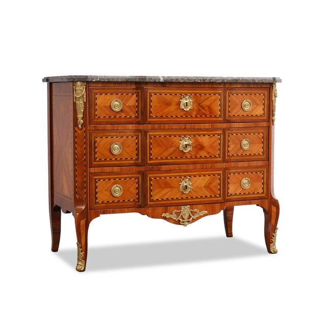 This exquisite commode was crafted around 1760 by the renowned cabinetmaker louis foureau and represents the elegant...