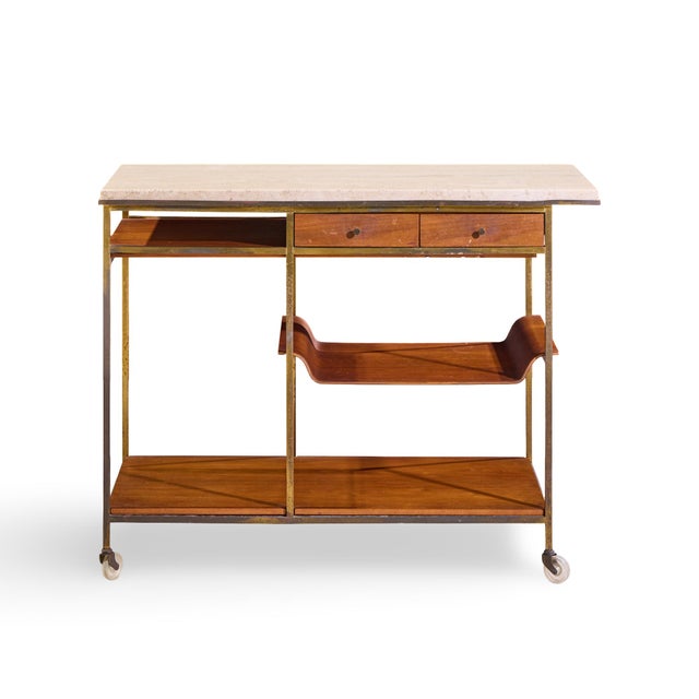 Paul McCobb for Calvin Irwin Collection Model C9203 Mid Century Travertine, Brass and Mahogany Bar Cart This bar cart...