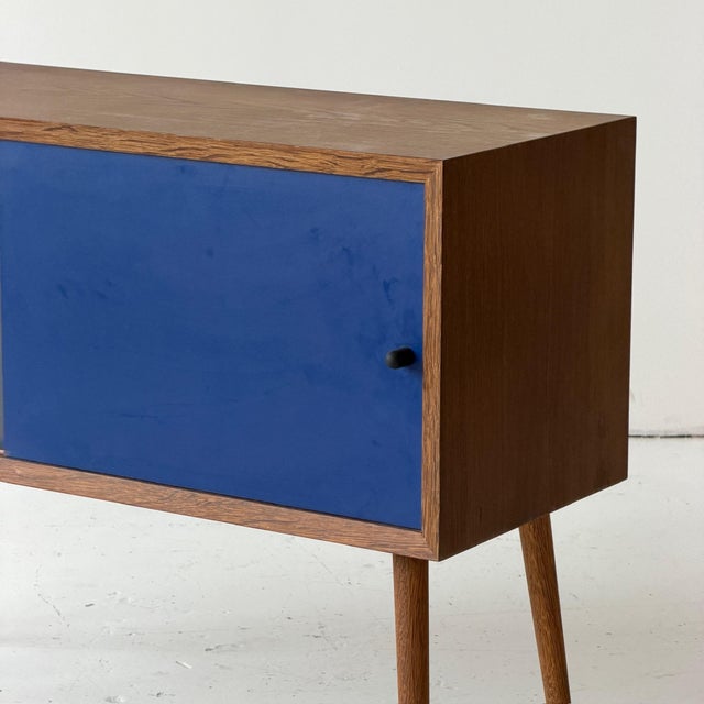 c. 1970s. Denmark. Two tone doors with full wood frame.