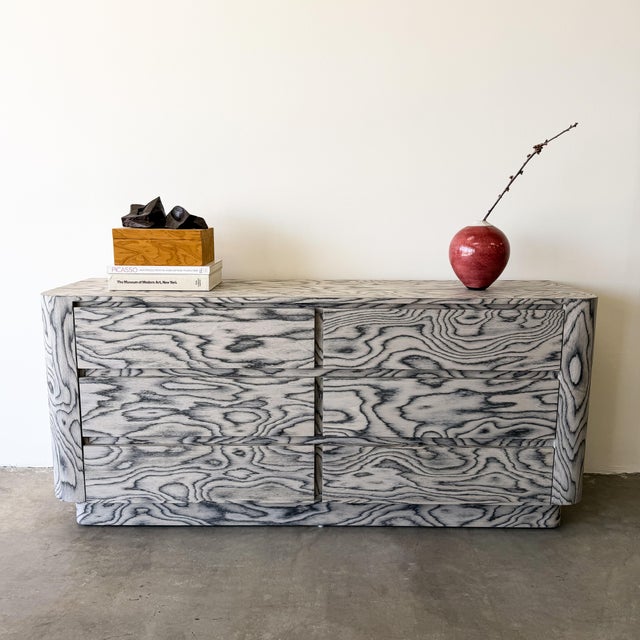 Vintage 1980s Italian Postmodern dresser featuring striking ALPI veneer designed by Ettore Sottsass, one of the most...