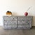 Vintage 1980s Italian Postmodern dresser featuring striking ALPI veneer designed by Ettore Sottsass, one of the most...