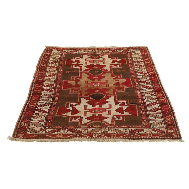 Decorative handknotted vintage Caucasian wool rug. Approximatelly 65-75 years old. In very good condition.