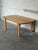 This oak coffee table features a clean rectangular top supported by sturdy square legs with distinctive finger-joint...
