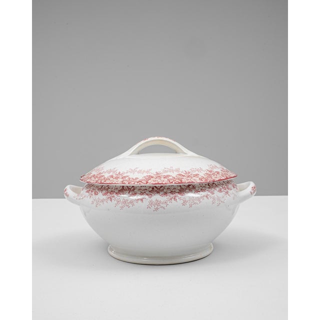 This 20th Century Dutch special edition porcelain tureen features a generous rounded form set on a subtly flared pedestal...