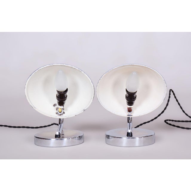 This pair of table lamps is an excellent example of progressive Czechoslovak design from the early 20th century....