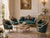 This exceptional early 1900s French Louis XVI–style seating suite is a rare coordinated five-piece ensemble consisting of...