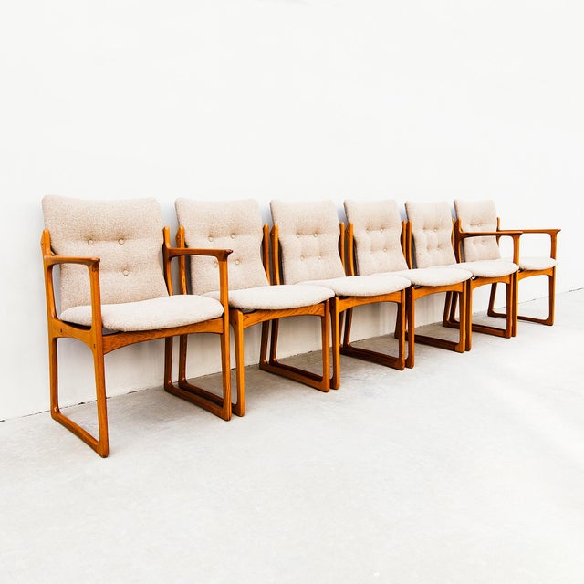 Mid century modern sled leg dining chairs by Vamdrup Stolefabrik, made in Denmark c. 1970s. The design is both familiar...