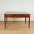 Handsome mid 19th century English partners desk handcrafted in mahogany with a tooled green leather top on a case with...