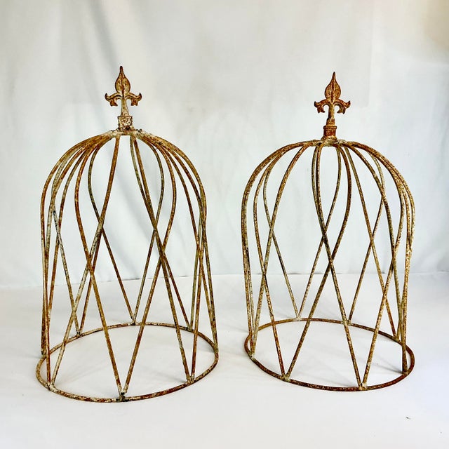 These are a pair of French Garden Topiaries. The hand-forged wrought iron Trellis bells are almost 20” and are topped with...