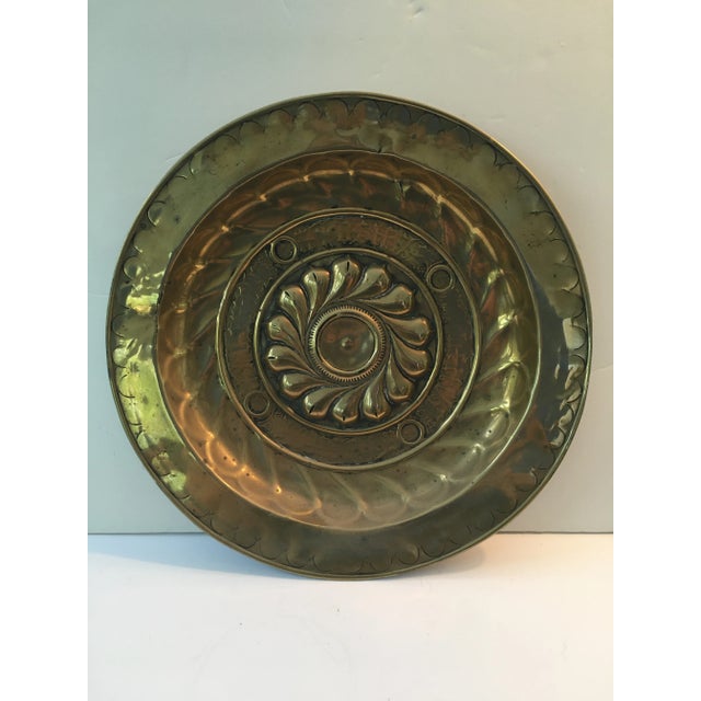 This authentic alms dish dates from the 17th century. The origin is Germany and it is solid brass. This is from my...