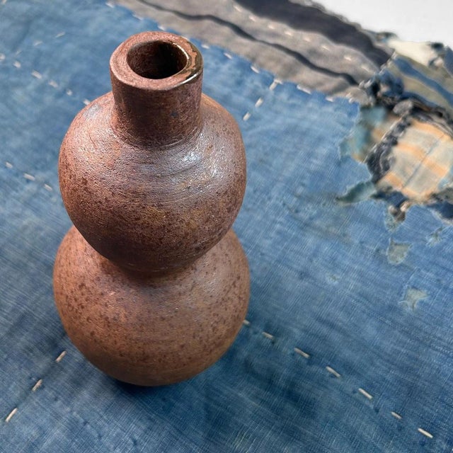 This exceptional Japanese earthenware vase, shaped like a double gourd (hyōtan), embodies the essence of Japanese...