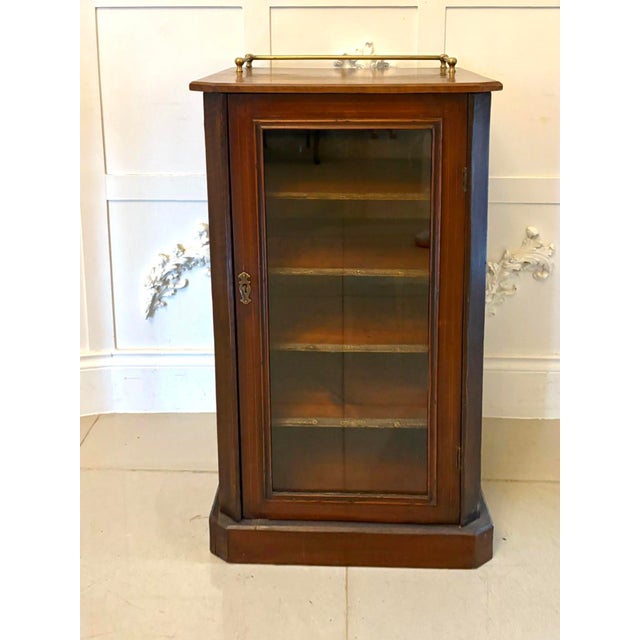 An elegant mid-to-late 19th century victorian mahogany sheet music cabinet of fine quality and rich colour featuring a...