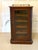 An elegant mid-to-late 19th century victorian mahogany sheet music cabinet of fine quality and rich colour featuring a...