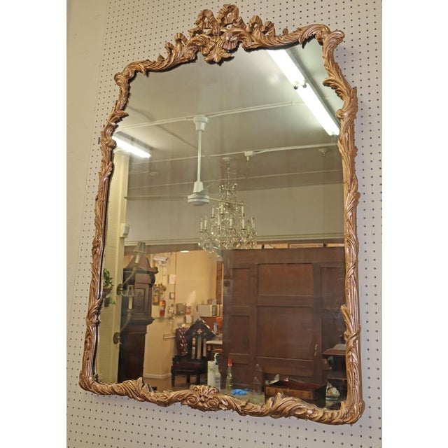 Early 20th Century Louis XV French Style Gold Gilt Mirror Dimensions : 38" Wide X 54" Tall X 2" Deep This stunning mirror...