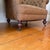 Pair of Chesterfield Tufted Deep Club Chairs With Turned Wooden Legs and Brass Casters For Sale - Image 12 of 16
