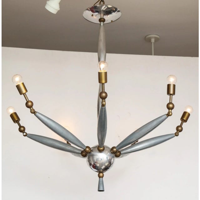 Italian articulated chrome and brass chandelier.