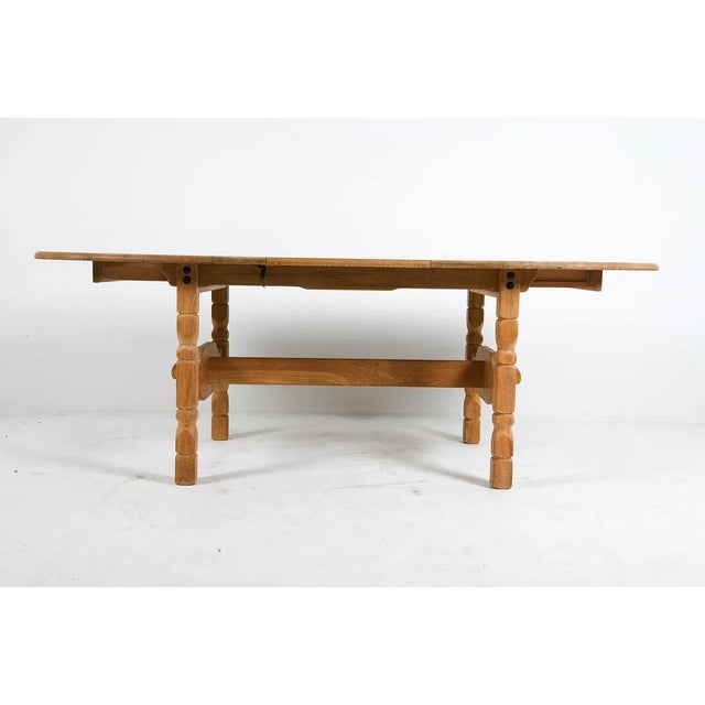 A solid, and well made, 20th century Scandinavian / Danish modern dining table. The table is constructed in the manner...