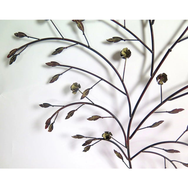 Jere style metal sculpture with leaves and flower motif. The attention to detail in this sculpture is remarkable. I...