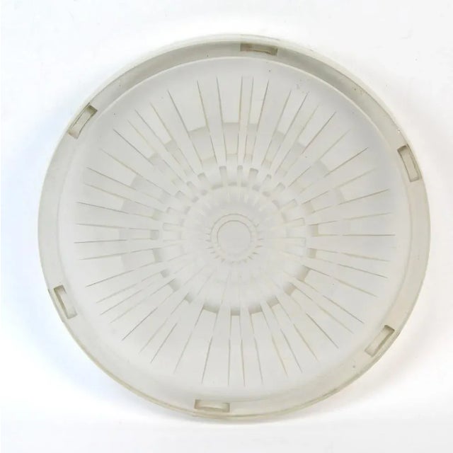 Moulded Glass Trivet by Hunebelle, 1930s, in Good conditions. Designed 1920 to 1949 This piece is attributed to the...