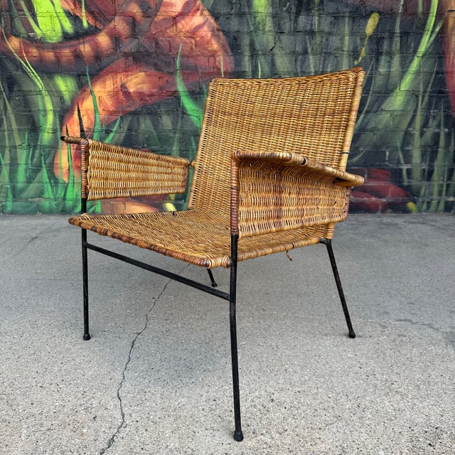Van Keppel-green rattan and iron outdoor or indoor chair.