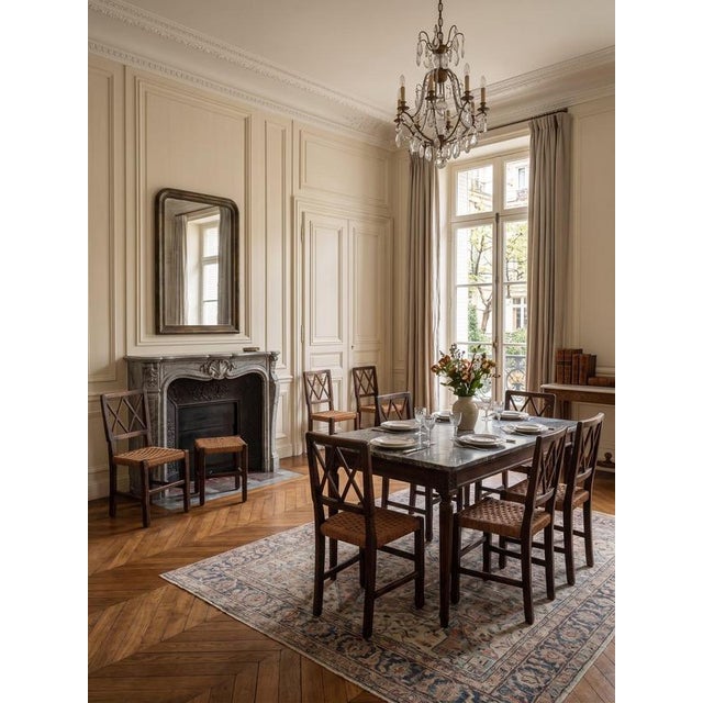 This set of six dining chairs embodies the sophisticated elegance and craftsmanship typical of mid-century Italian design....