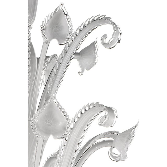 Venetian white “Ca’ Rezzonico” Murano glass chandelier whit trasparent hand-made pinced trimming. For traditional and...