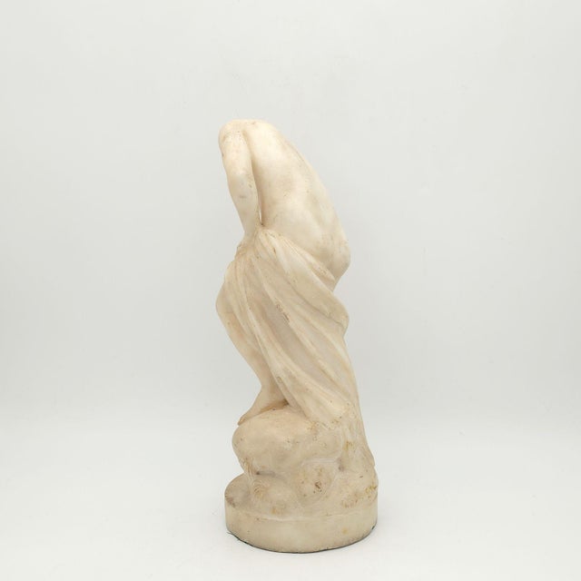 A nice Grand Tour alabaster female bather, 19th century or earlier.