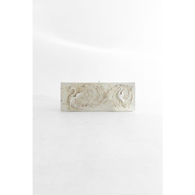 19th c Italian plaster relief, in the style of the Neoclassical period. The rectangle shaped relief features a design of a...