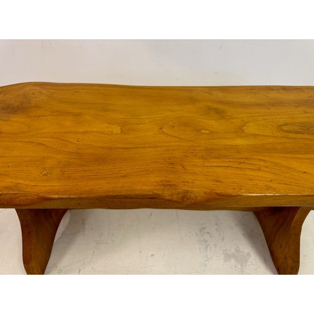 1960s Coffee table This elm coffee table showcases the natural beauty and unique characteristics of the wood. Crafted in...