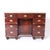 Handsome antique British colonial desk Crafted in mahogany in a campaign form with the original red leather top, nine...