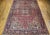"Beautiful hand-knotted Persian Heriz in geometric pattern circa the early 20th Century. The rustic red field sets a warm...