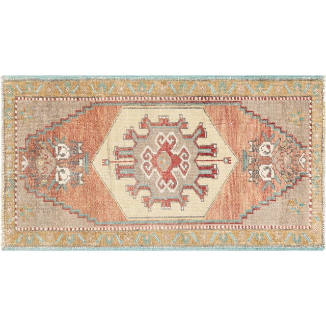 This Vintage Turkish Oushak Yastic rug measures 1'9" x 3'2" and features a unique, intricate design. Made with high-...