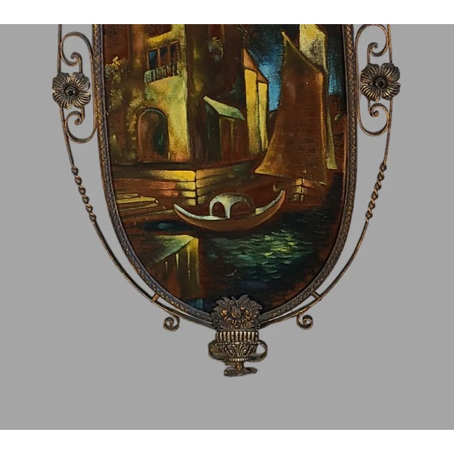 This antique Italian wall art boasts a bronzed metal Tole frame with a beautiful Venetian Night Scene that has been...