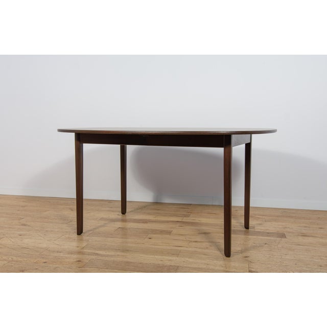 The Rungstedlund dining table was designed by Ole Wanscher and manufactured in the 1960s by Poul Jeppesen in St. Heddinge,...