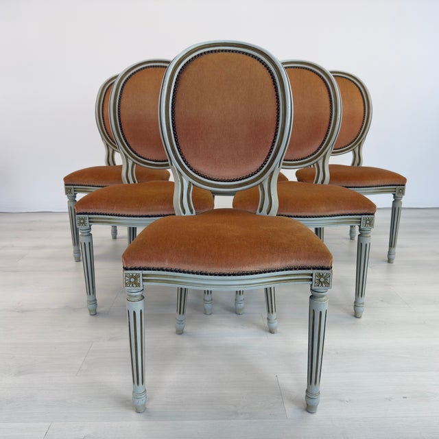 Dimensions: H 38.5” x W 19.3” x SH 19” Set of 6 Vintage French Louis XVI style Medallion back dining chairs. Upholstered...