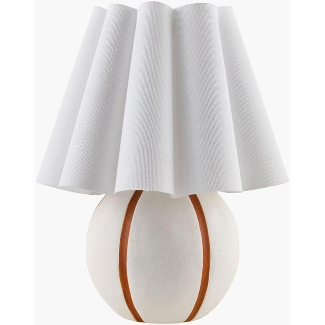Illuminate your space with the Kinki accent table lamp, a captivating blend of Arts & Crafts Traditional style that...