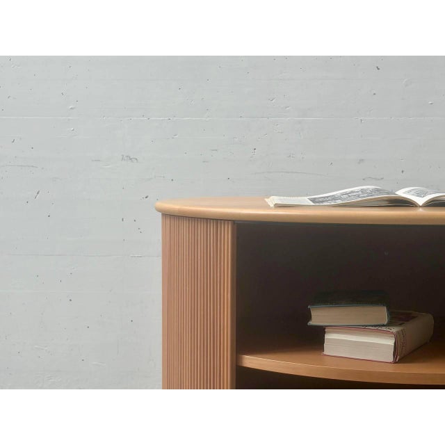 Iconic swiss roll-top cabinet b, designed in 1977 by trix and robert haussmann for the röthlisberger collection. This...