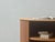 Iconic swiss roll-top cabinet b, designed in 1977 by trix and robert haussmann for the röthlisberger collection. This...