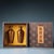 Matching pair of Chinese gilded bronze vases with high relief carved panels featuring the Four Gentlemen (Plum, Orchid,...