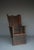 A Welsh antique high back chair known as a lambing chair. It was made around 1820 and historically these chairs were used...