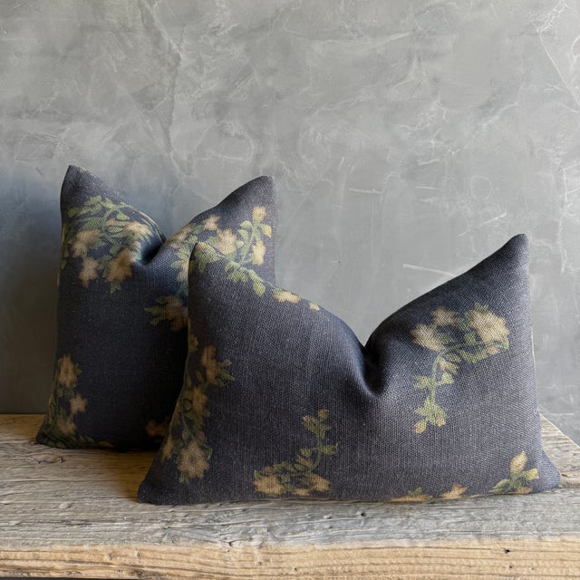 Wabi Sabi Collection A faded stone washed black background, creme, beige, light grey and green floral accents. This pillow...