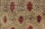 Turkish Tulu With Repeating Tribal Motifs on a Sand Field Surrounded by a Red Border For Sale - Image 10 of 13