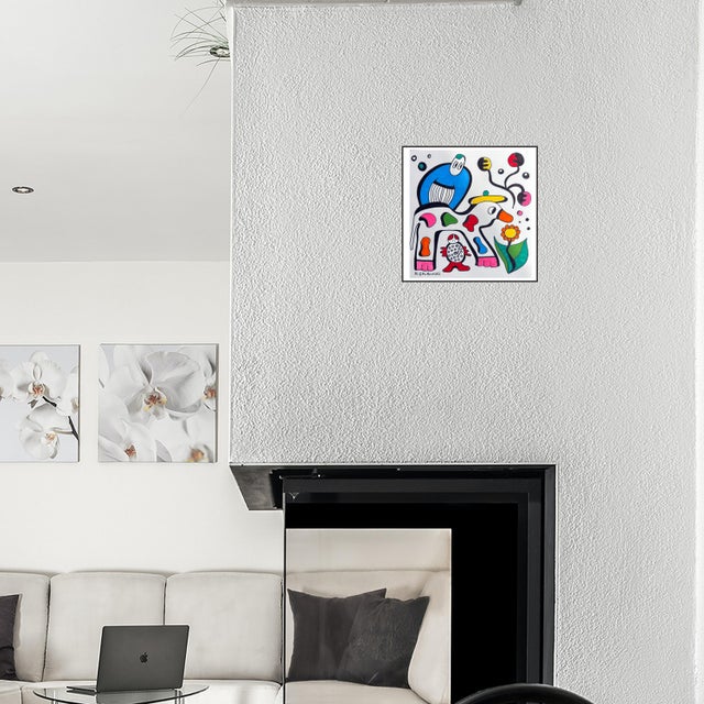 The Gentle Rider unfolds like a small fable made of color, tenderness, and imagination. A calm blue figure rides a...