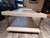 A glam, midcentury-meets-Hollywood-Regency style table. Table is in very good condition with one small ding on the lower...