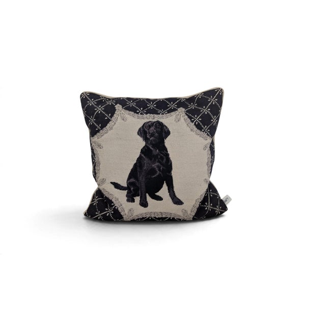A charming pair of decorative needlepoint pillows featuring portrait-style Labrador retrievers — one black Lab and one...