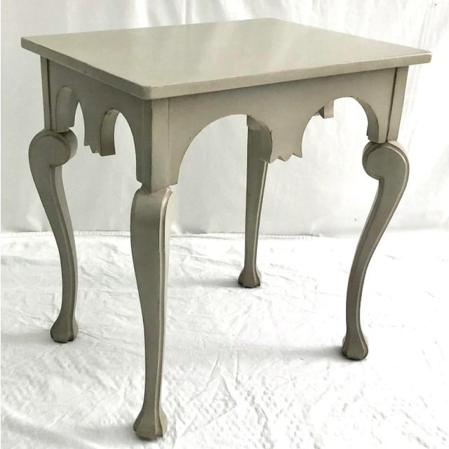 A Somerset Bay Mahogany Mendocino Side Table with a Lightly Distressed Lacquered Truffle Painted Finish 24"x 18.75"x...