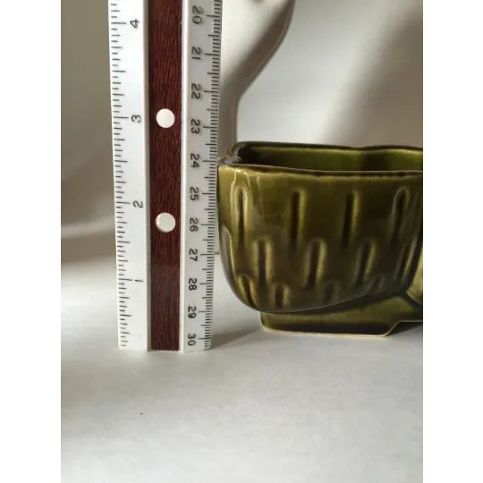 Beautiful vintage stamped ceramic green planter. Perfect for any tabletop space or bookcase and for the interior designer.