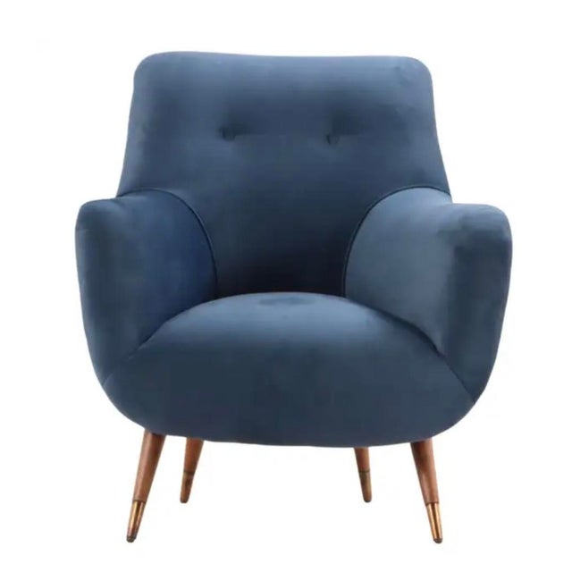 Pair of Italian mid-century modern upholstered club chairs c. 1950. Mid-century modern Italian club chairs are a stylish...