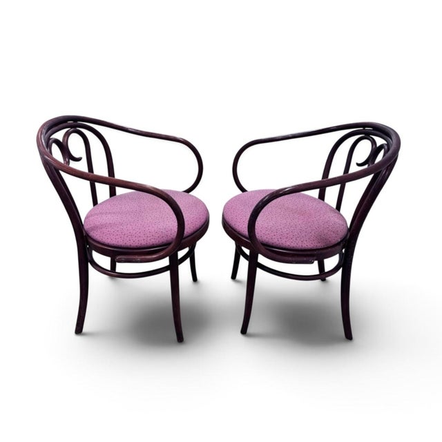 Cute pair of two Thonet style armchairs with balloon style arms. A nice spin on a classic this style would look great at a...